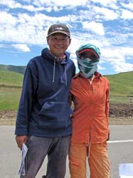 It's really great to meet people like you on the road. This couple of bicyclists has traveled for 30 days and heads towards their finish in Chengdu.